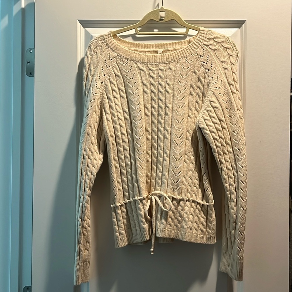 Cream cable knit sweater with drawstring
